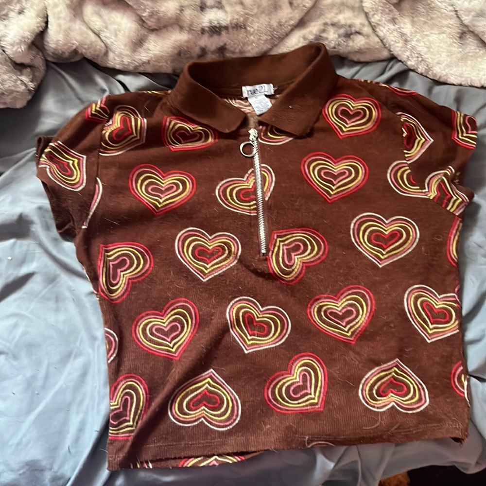 A polo zip up T-shirt it’s not long cute crop top w/low rise full length w/high